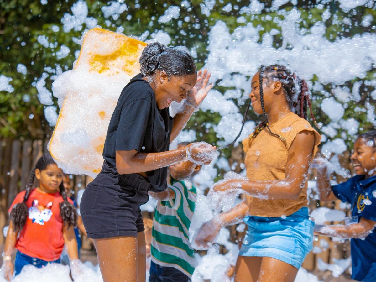 Families and children celebrating together at a community event